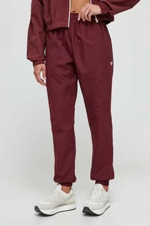 Spodnie damskie - Reebok Classic spodnie dresowe kolor bordowy gładkie - grafika 1