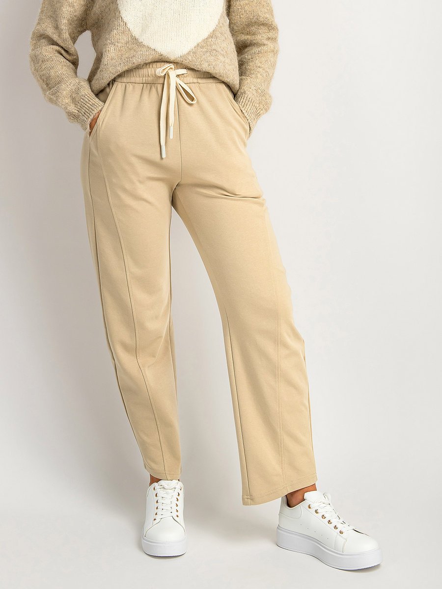 Spodnie z domieszką bawełny beżowy L