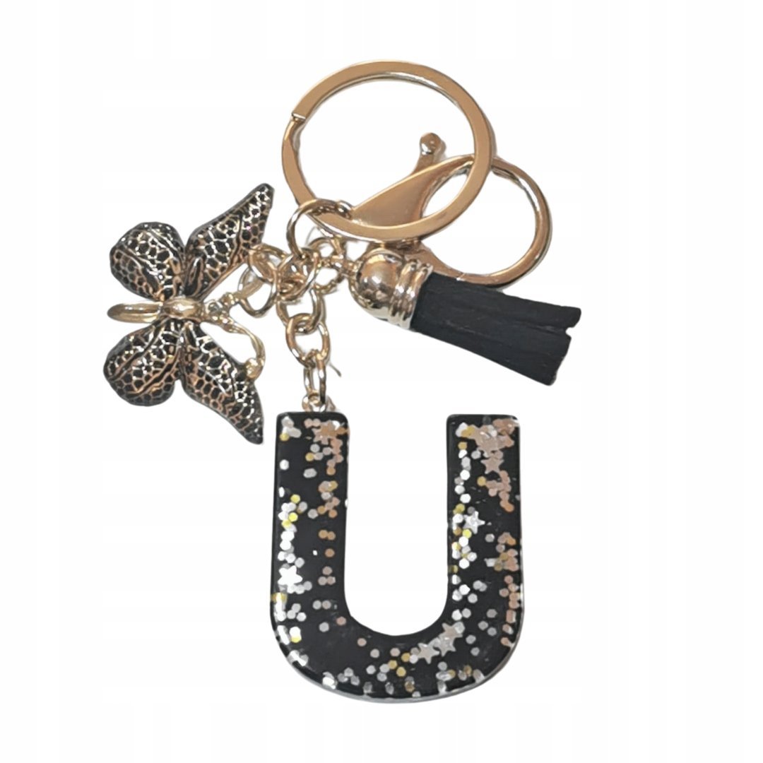 Brelok z literą U - elegancki czarny design z motylem