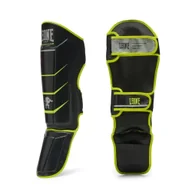 Ochraniacze do sportów walki - Leone ochraniacze piszczeli REVO PERFORMANCE FLUO czarne - miniaturka - grafika 1