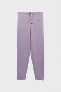Spodnie i spodenki dla dziewczynek - Guess spodnie dresowe dziecięce kolor fioletowy gładkie - grafika 1