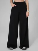 Spodnie sportowe damskie - 4F Spodnie dresowe z szerokimi nogawkami damskie - czarne XS - miniaturka - grafika 1