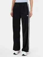Spodnie sportowe damskie - adidas Spodnie dresowe adicolor Classic Firebird JC8245 Czarny Loose Fit - miniaturka - grafika 1