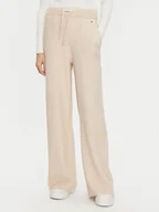 Spodnie damskie - Tommy Hilfiger Spodnie dzianinowe UW0UW05523 Beżowy Relaxed Fit - miniaturka - grafika 1