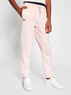 Spodnie i spodenki dla chłopców - Lacoste Spodnie dresowe XJ9476 Różowy Regular Fit - grafika 1