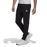 Spodnie sportowe męskie - Spodnie dresowe adidas Essentials Tapered GK9222 - czarne - miniaturka - grafika 1