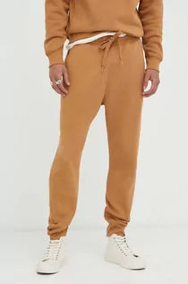 Spodnie męskie - G-Star Raw spodnie dresowe kolor brązowy gładkie - grafika 1