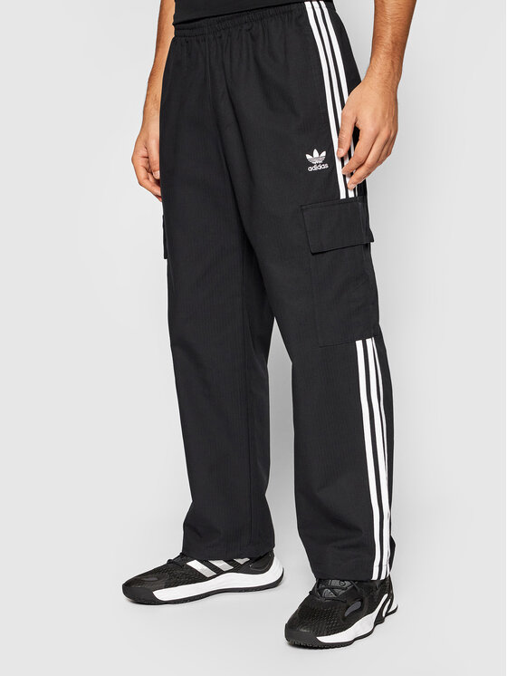 Adidas Spodnie materiałowe adicolor Classics 3-Stripes H09117 Czarny Relaxed Fit