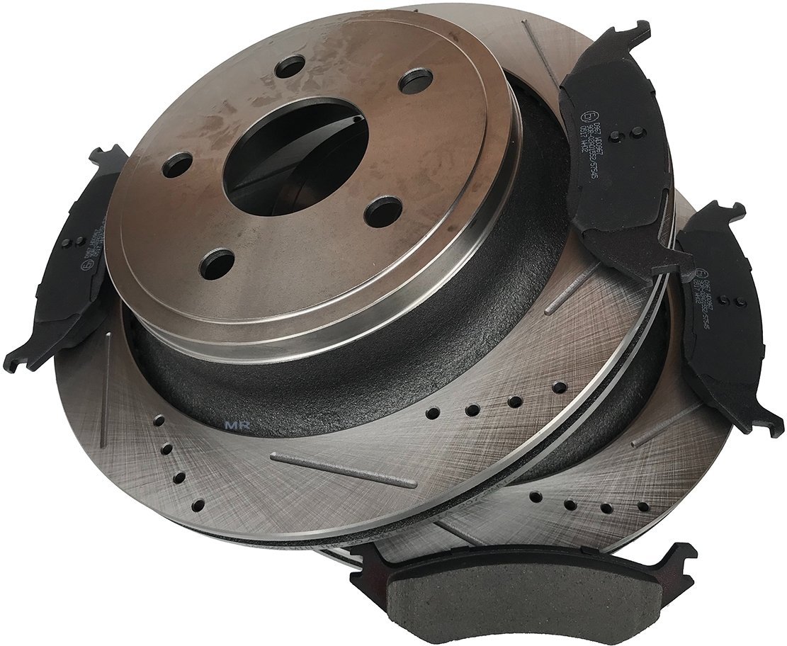 Tylne klocki + WIERCONE NACINANE tarcze hamulcowe 5 szpilek Dodge RAM 1500 2003-