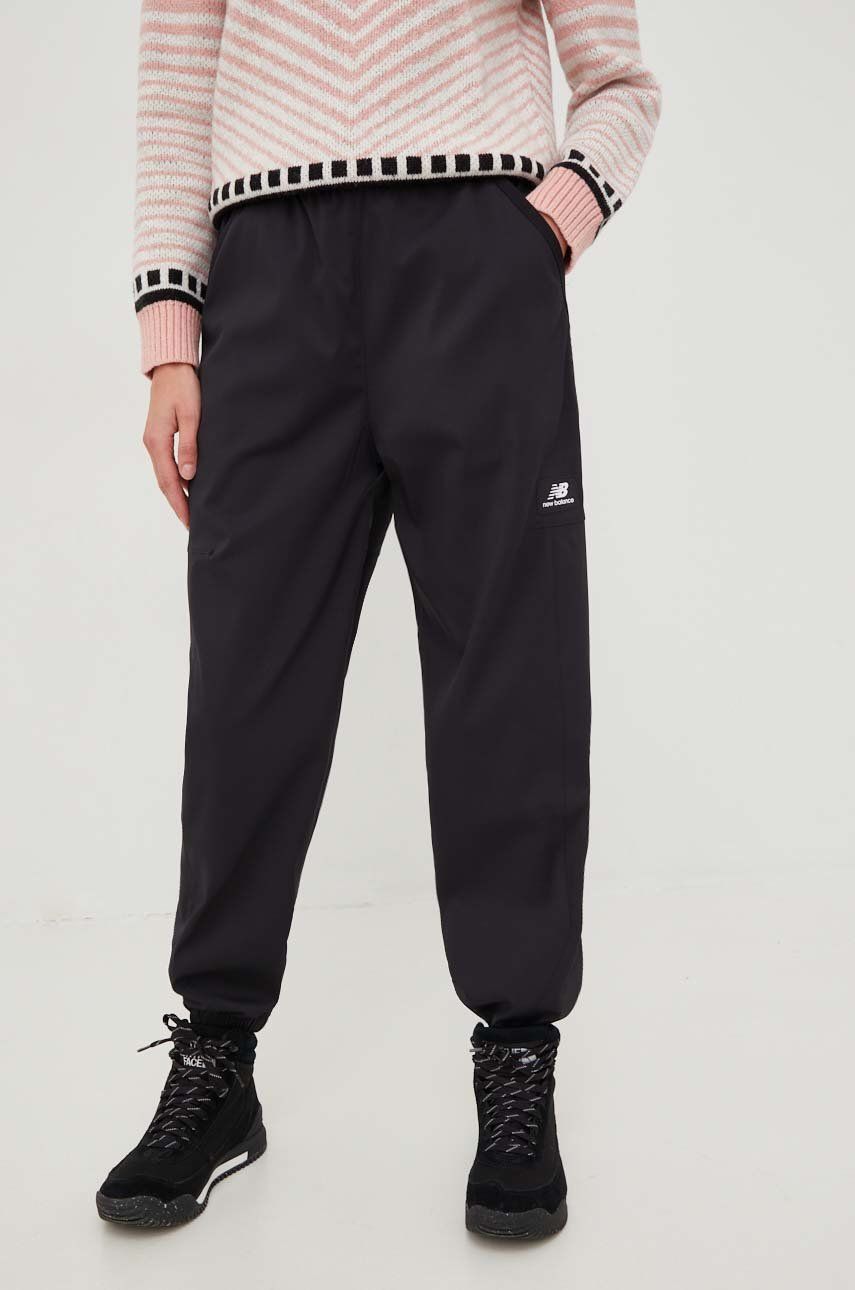 New Balance spodnie dresowe damskie kolor czarny gładkie