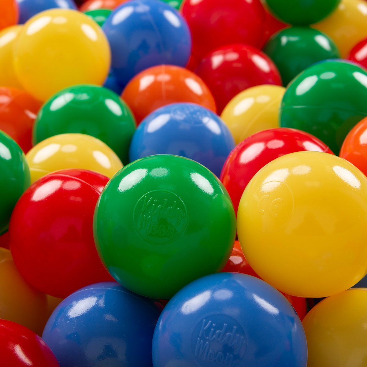 KiddyMoon, plastikowe piłeczki 6cm żółty-zielony-niebieski-czerwony-pomarańcz 500/6cm