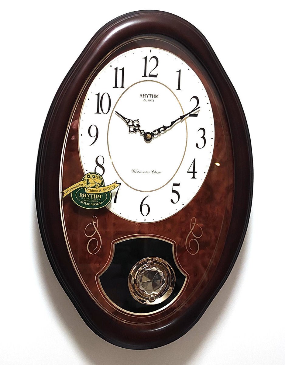 Zegar ścienny Rhythm CMJ320NR06 56 cm kuranty