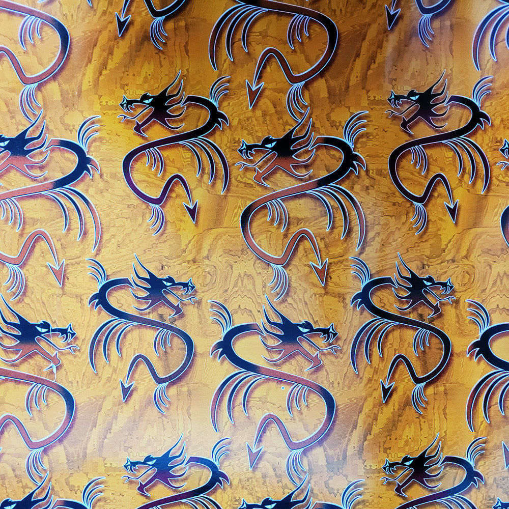 Papier pomarańczowy smoki do prezentów 57cmx20m 20m207