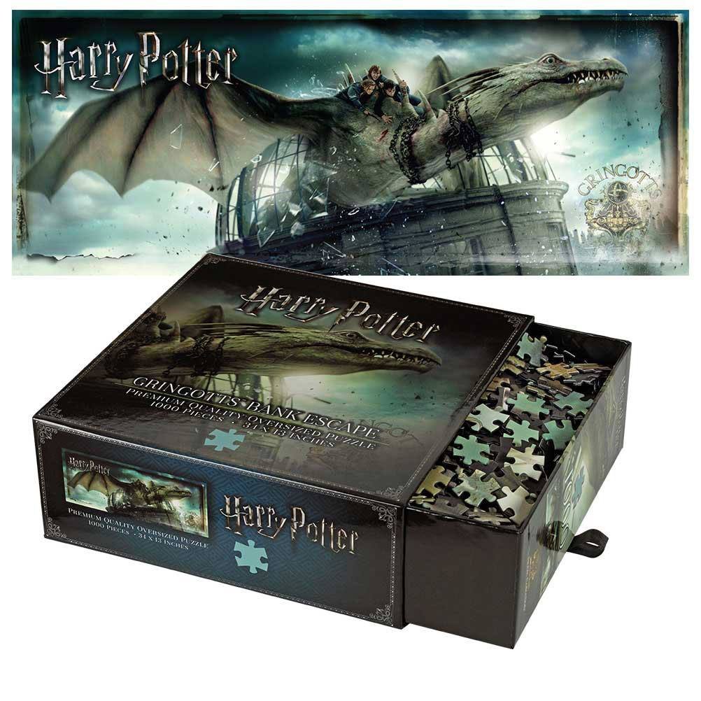 The Noble Collection 1,000 piece jigsaw of Harry, Hermione's and Ron's dramatic escape from the Gringott's Bank on the back of the Ukranian Ironbelly dragon. Measuring 34
