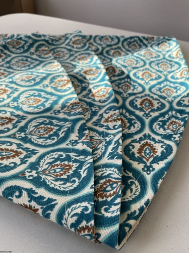 Okrągły bawełniany obrus plamoodporny turkusowego koloru z wzorem Orientał