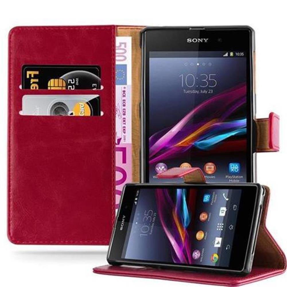 Luxury Cadorabo - Book Style Hülle für Sony Xperia Z1 - Case Cover Schutzhülle Etui mit Standfunktion und Kartenfach in WEIN-ROT