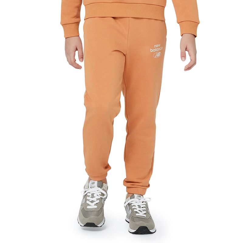 Spodnie New Balance YP31508SEI - pomarańczowe