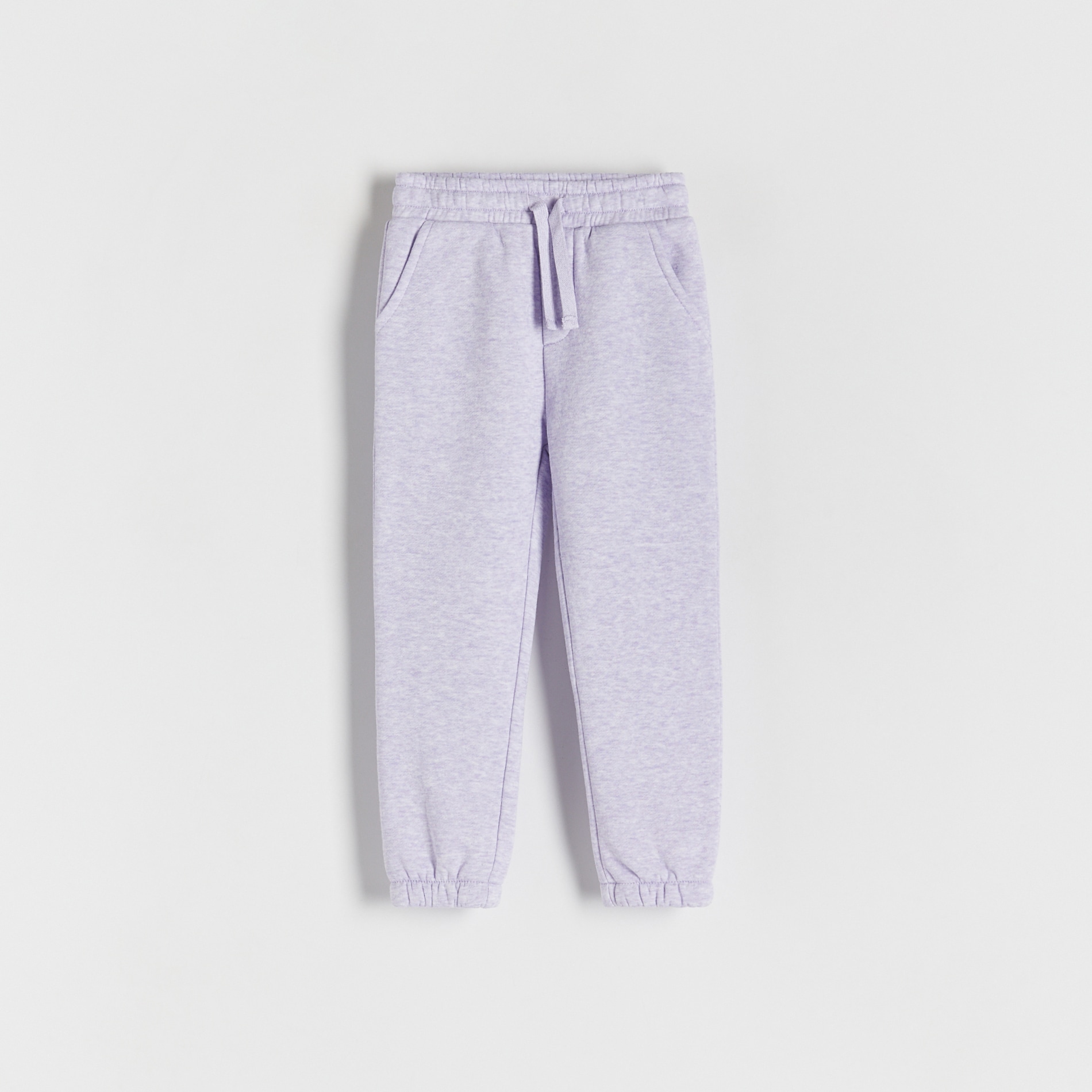 Reserved - Dresowe spodnie jogger - lawendowy