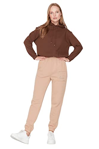 TRENDYOL Damskie spodnie do biegania ze średnim stanem, krój skinny fit, luźne spodnie do biegania, beżowy, L