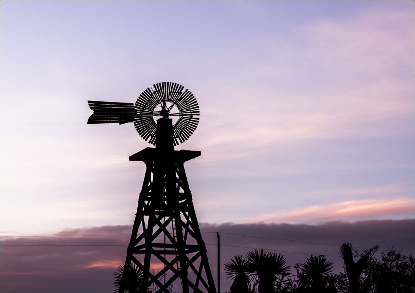 Silhouetted windmill in Texas., Carol Highsmith - plakat 100x70 cm
