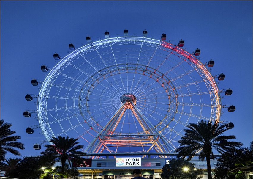 Neon-lit Ferris wheel at dusk in ICON Park in the Orlando, Florida., Carol Highsmith - plakat 100x70 cm
