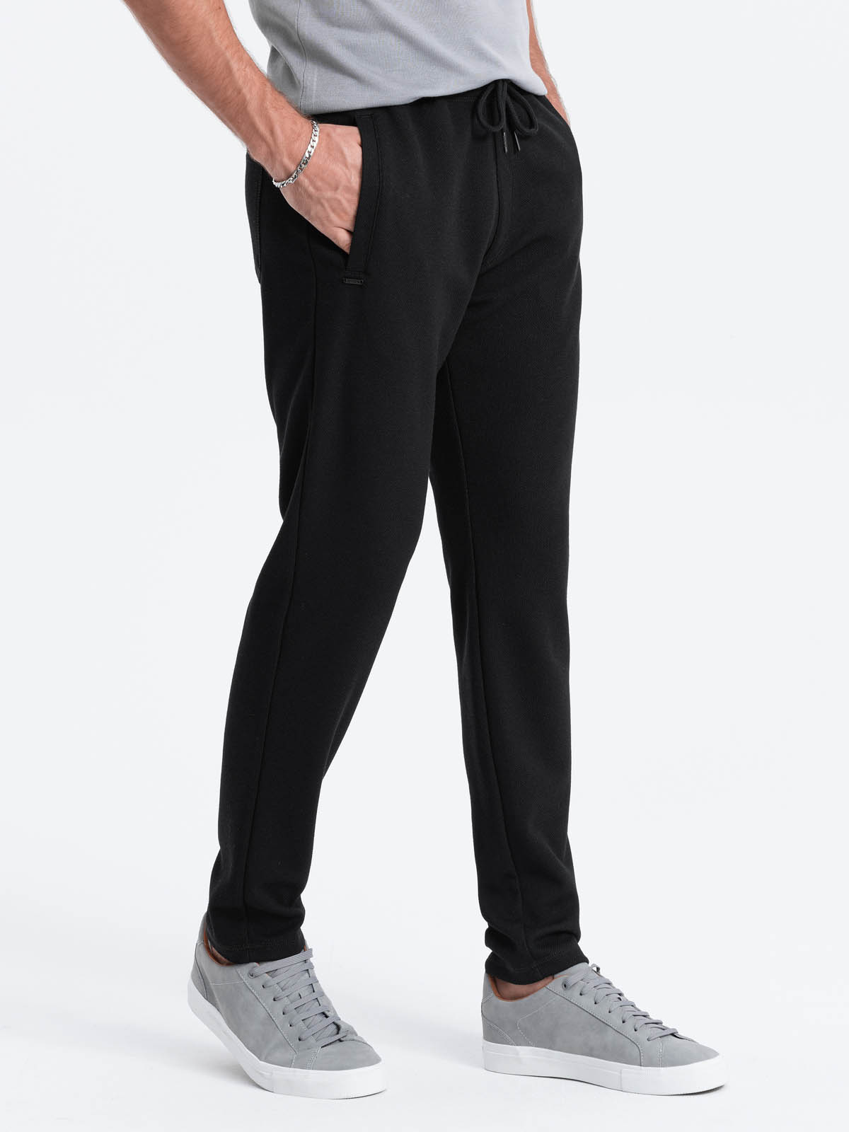 Męskie spodnie dresowe o marchewkowym kroju - czarne V1 OM-PASK-0166
