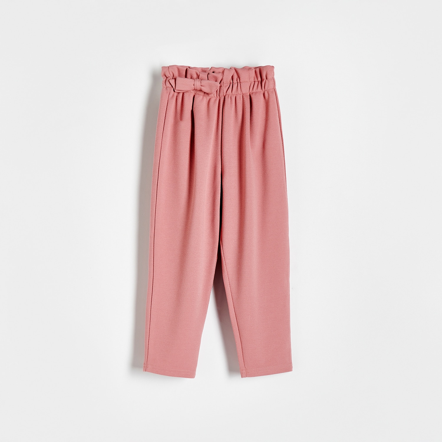 Reserved - Dzianinowe spodnie z kokardką - Różowy