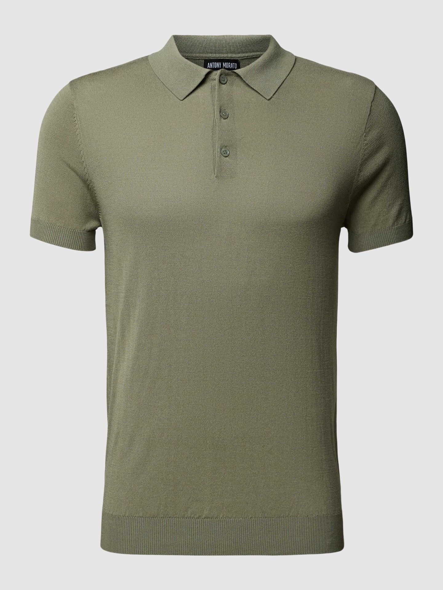 Koszulka polo o kroju slim fit w jednolitym kolorze