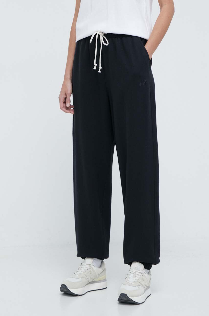 New Balance spodnie dresowe bawełniane kolor czarny gładkie