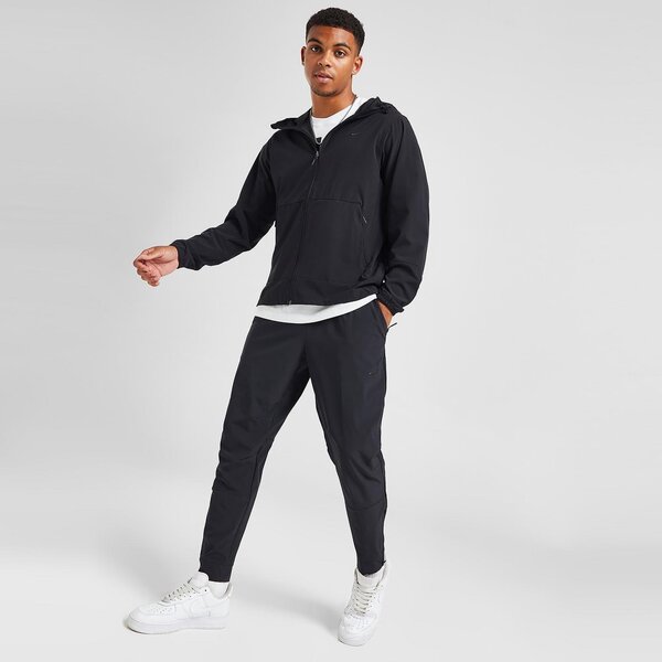 NIKE SPODNIE M NK DF UNLIMITED PANT TPR - Nike