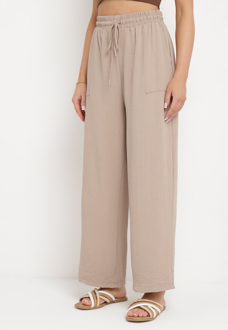 Ciemnobeżowe Spodnie z Prostą Nogawką i Kieszeniami oraz Sznurkiem w Talii Qulai