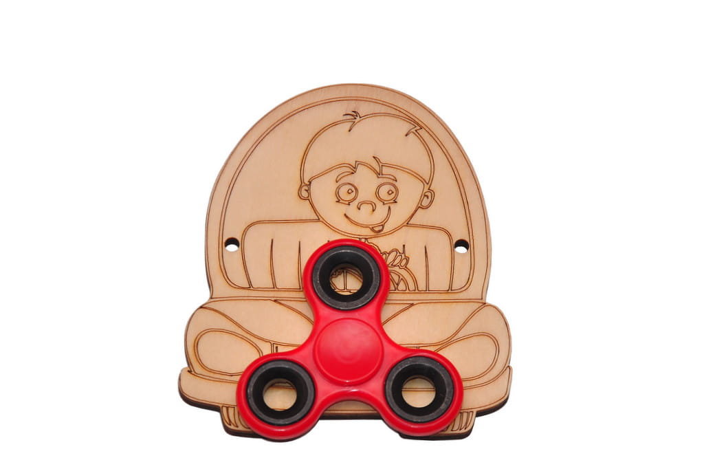 Eko autko + kolorowy spinner na tablicę manipulacyjna.