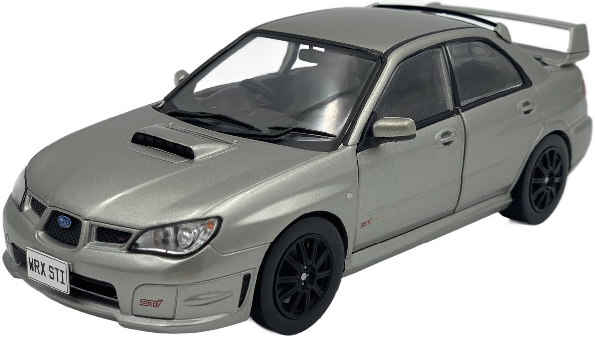 Subaru Impeza WRX STi model WB124208 WhiteBox 1:24 silver
