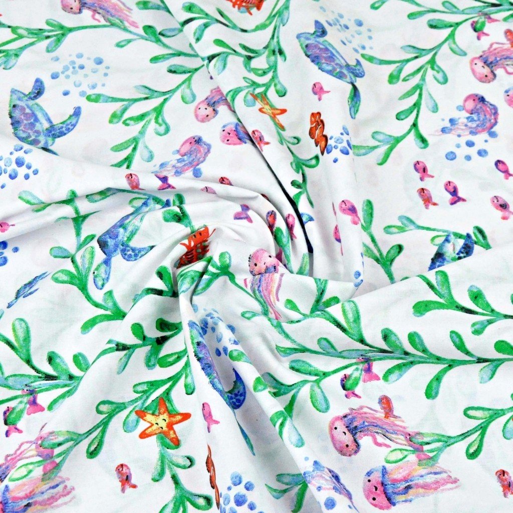 Tkanina bawełniana żółwie i meduzy na białym tle