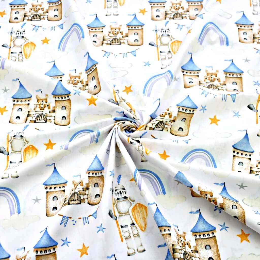 Tkanina bawełniana zamki beżowo niebieskie na białym tle