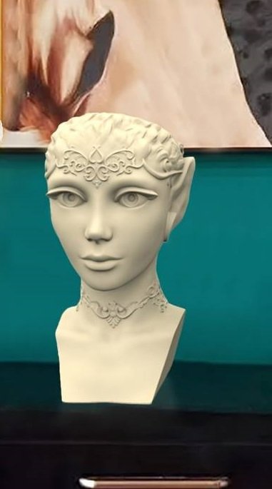 Figurka-głowa kobiety z otworem na roślinę.