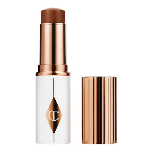 Charlotte Tilbury - Unreal Skin Sheer glow Tint — Nawilżający Podkład W Sztyfcie - Unreal Skin 14 Deep - Dla Kobiet