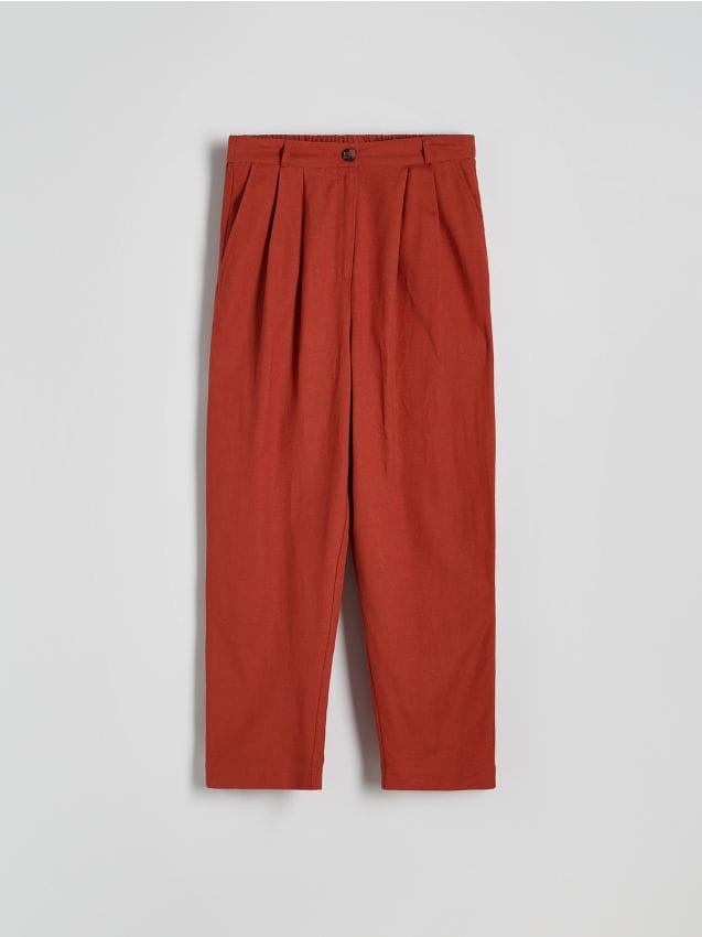 Reserved - Spodnie chino z wiskozą - jasnopomarańczowy