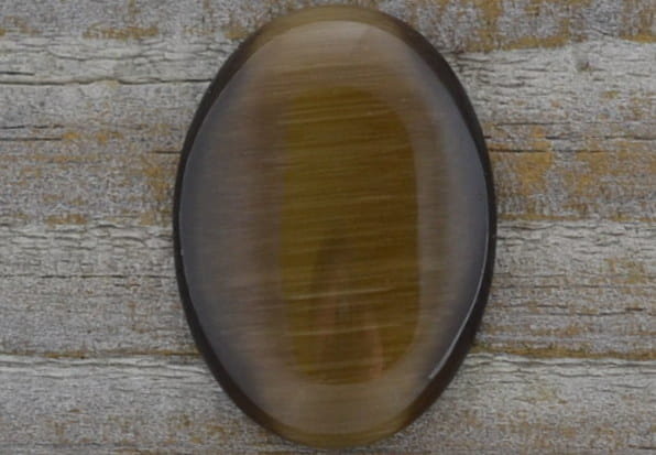 [046216] Kaboszon kocie oko 25*18mm brązowy