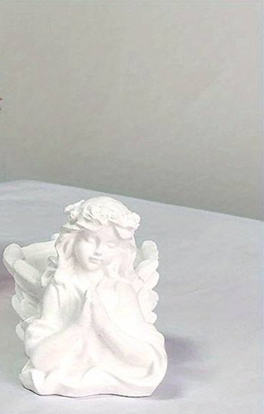 Figurka,osłonka -aniołek