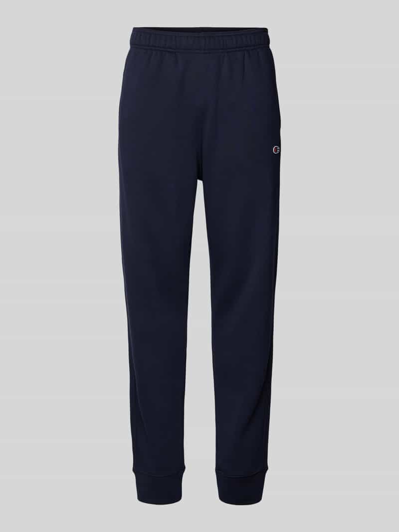 Spodnie dresowe o kroju regular fit z wyhaftowanym logo