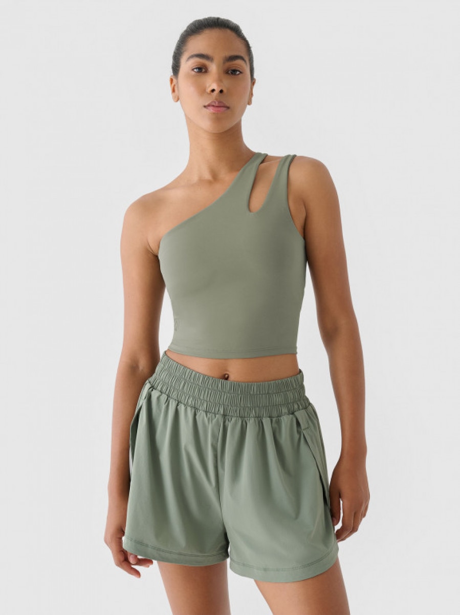 Damski crop top treningowy na jedno ramię 4F x Anna Lewandowska 4FALSAW24TFSLF515 - zielony - 4F x AL