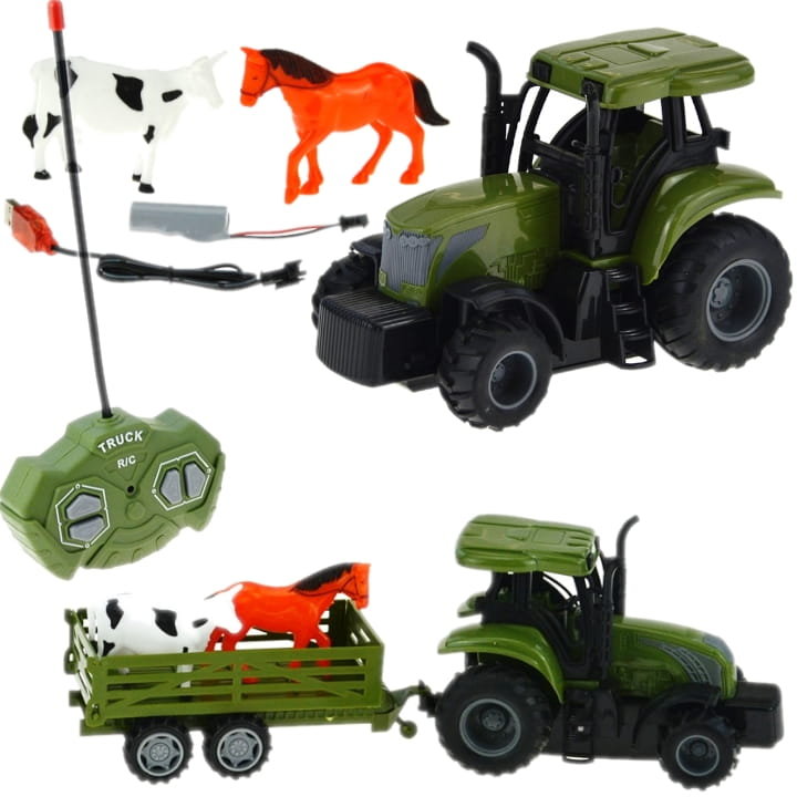 Traktor zdalnie sterowany z przyczepą + dwie figurki krowa konik