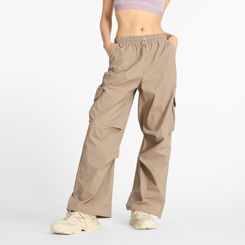 Spodnie damskie New Balance WP43534LMR  beżowe
