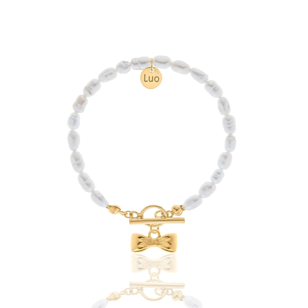 Bransoletka z naturalnych pereł z ozdobnym zapięciem i małą kokardką