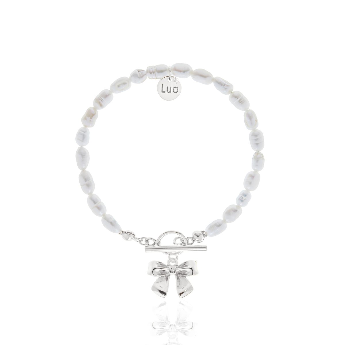 Bransoletka z naturalnych pereł z ozdobnym zapięciem i kokardką