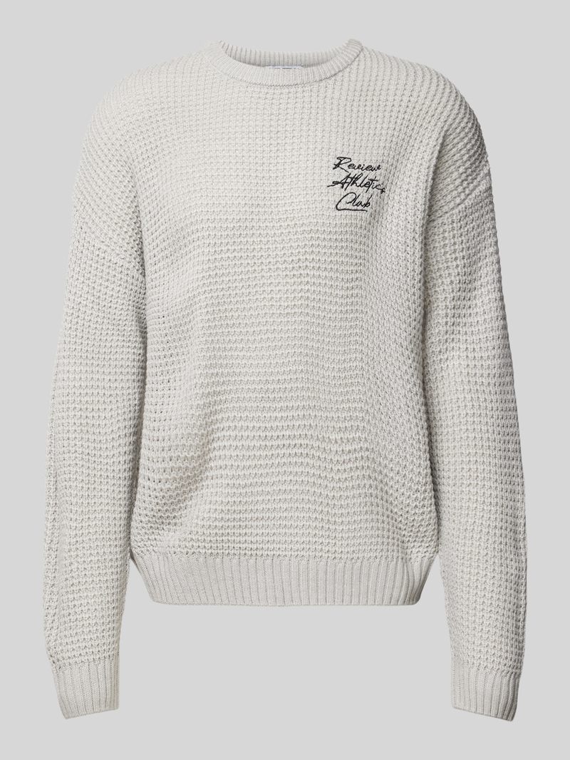 Sweter z dzianiny z wyhaftowanym logo