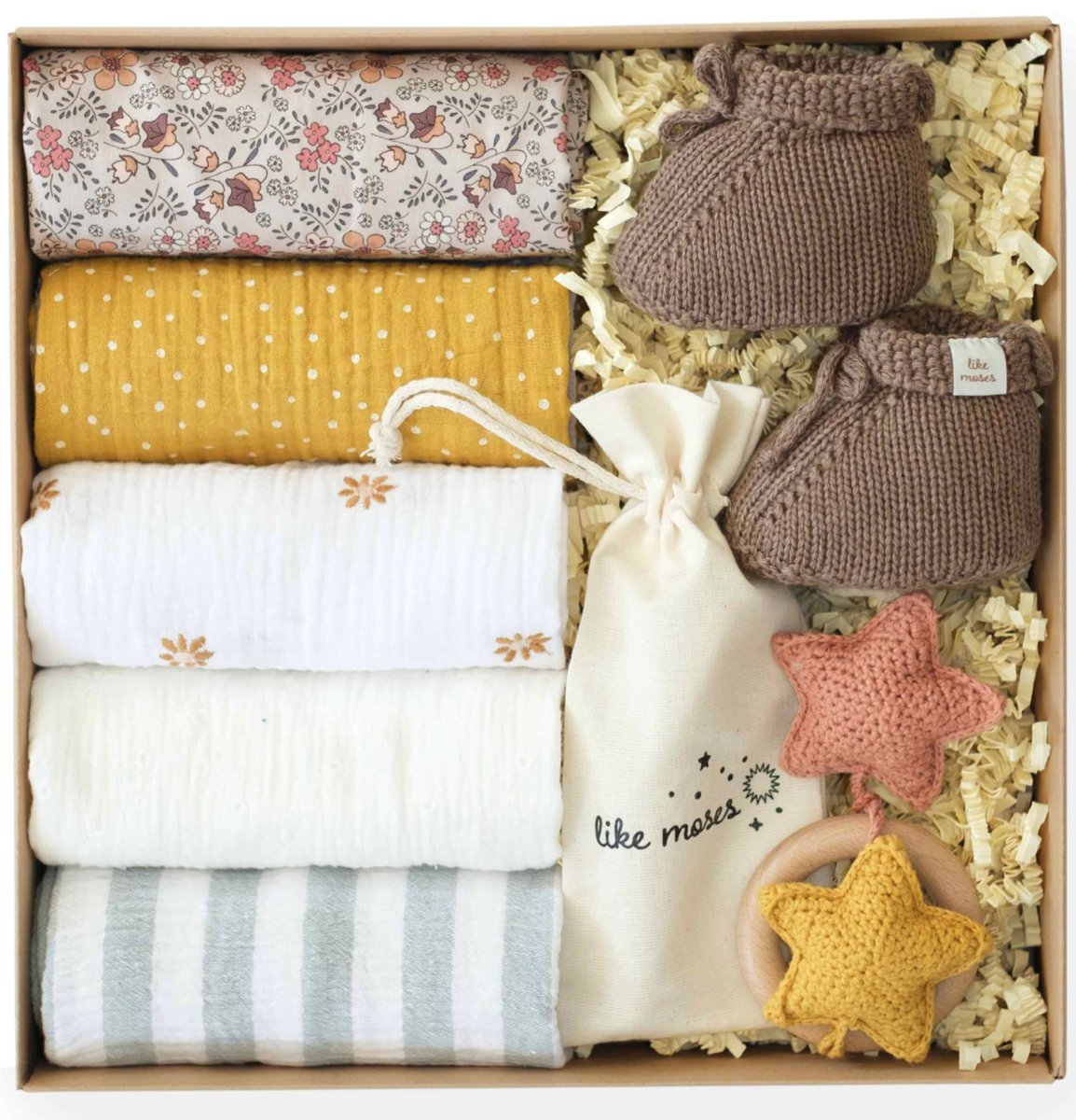 Zestaw prezentowy dla niemowląt (pieluszki, buciki, szczotka relaksacyjna, grzechotka- gwiazdki)