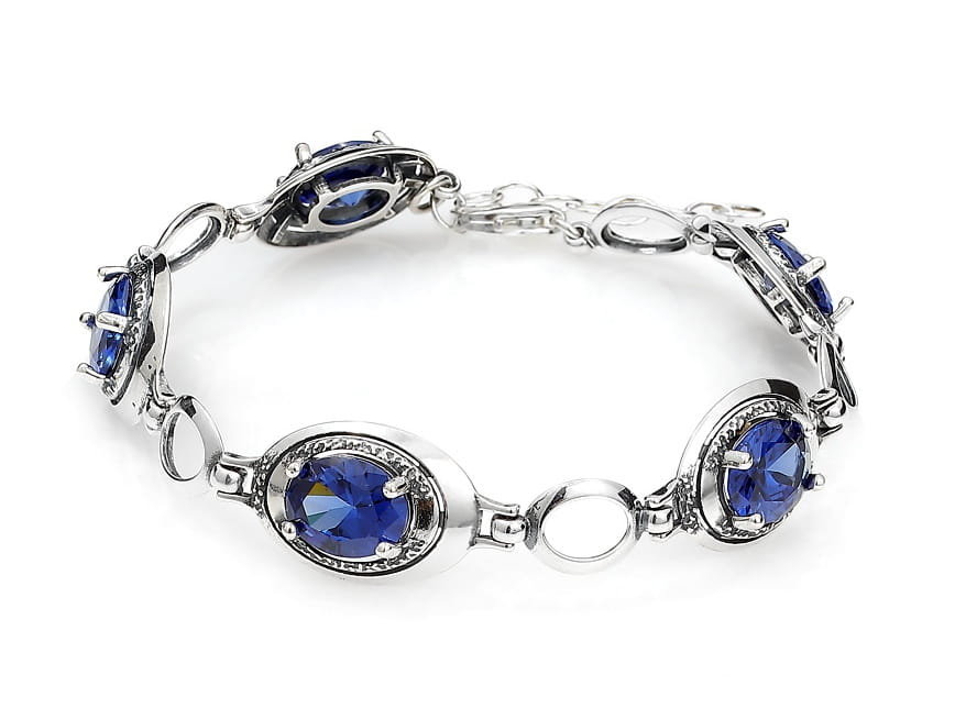 Srebrna bransoletka oksydowana z dużymi błyszczącymi szafirowymi cyrkoniami pr925