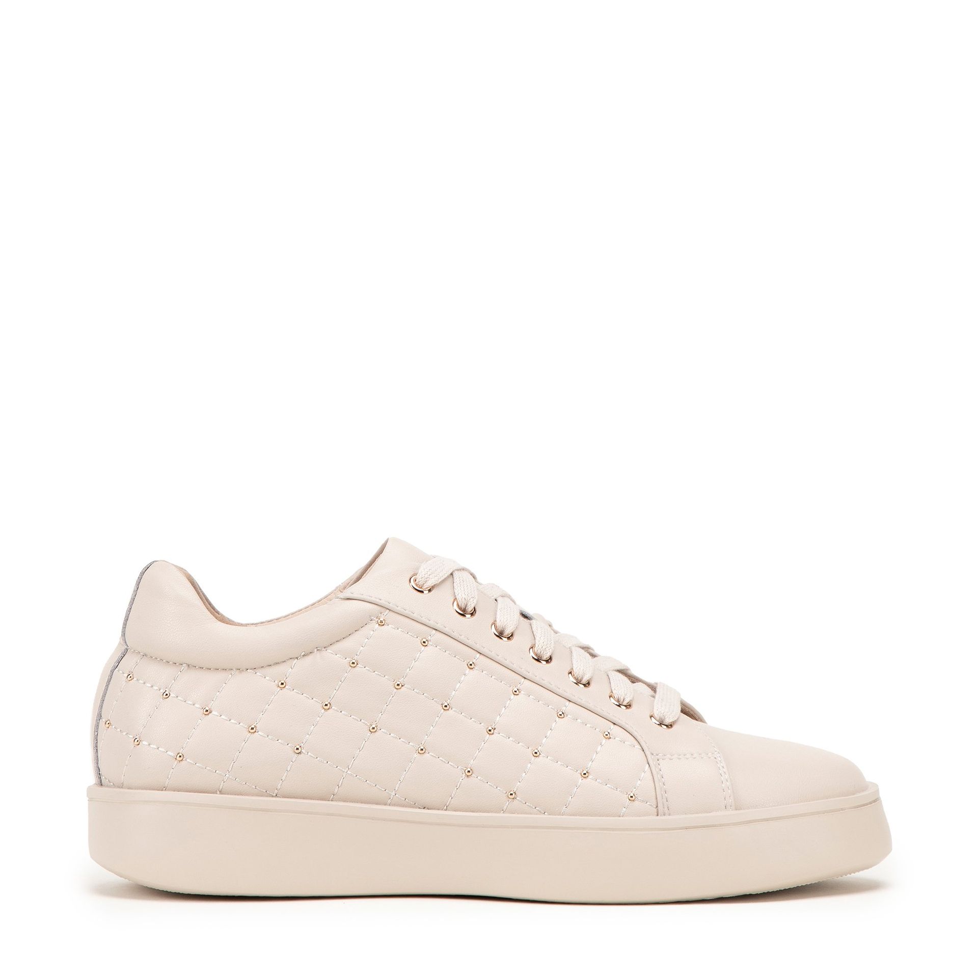 Damskie sneakersy skórzane z pikowaną cholewką kremowe